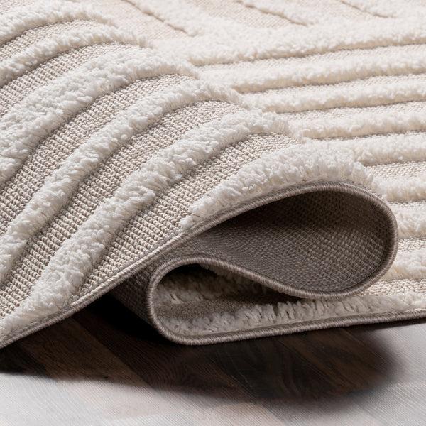 Nuloom Ianthe Abstract Stripes High-Low Tasseled Area Rug Beige
