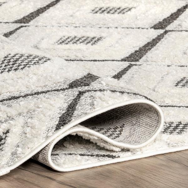Nuloom Nerissa High/Low Diamond Tasseled Area Rug Beige